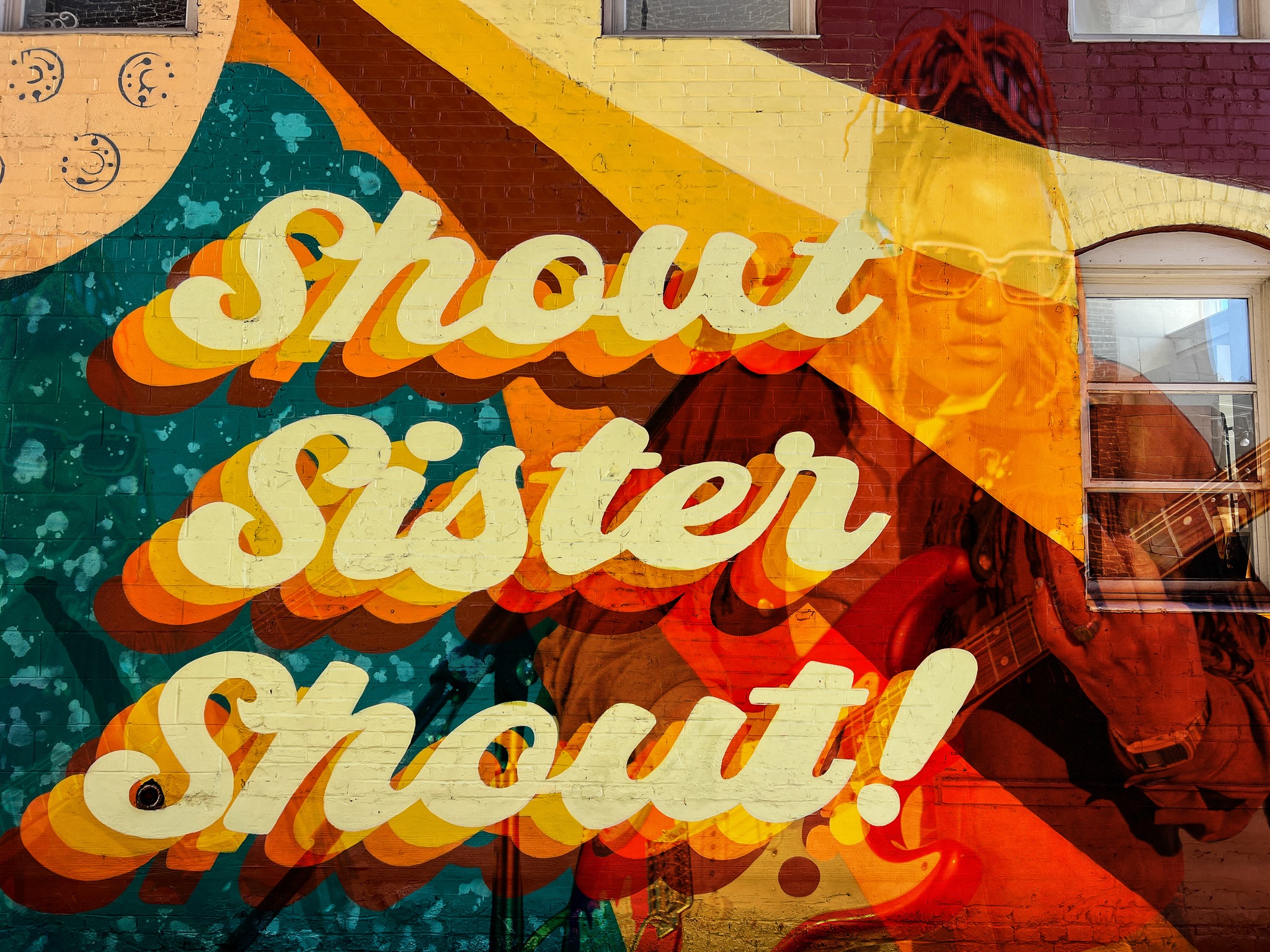 Shout Sister Shout Mural with King Honey Superimposed on image